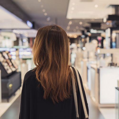 Woman in shopping centre